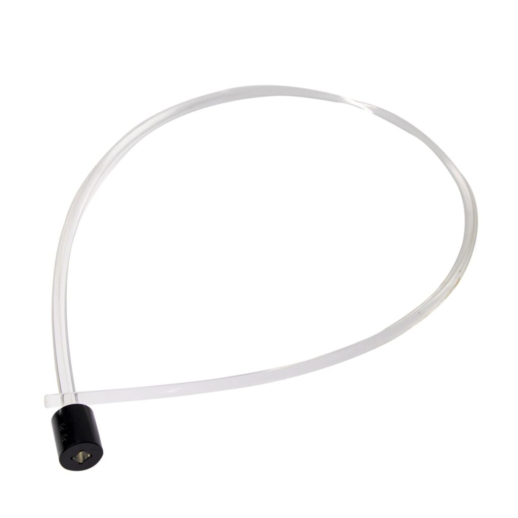 An unlit light whip showing the clear flexible strand running into a black cylindrical plug connector